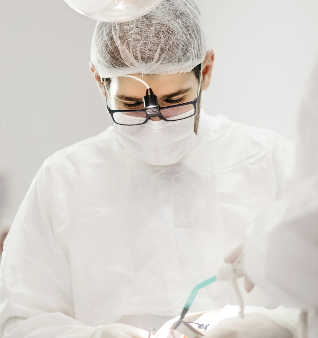 Doctor examining advanced regenerative medical tools with a focus on patient care.